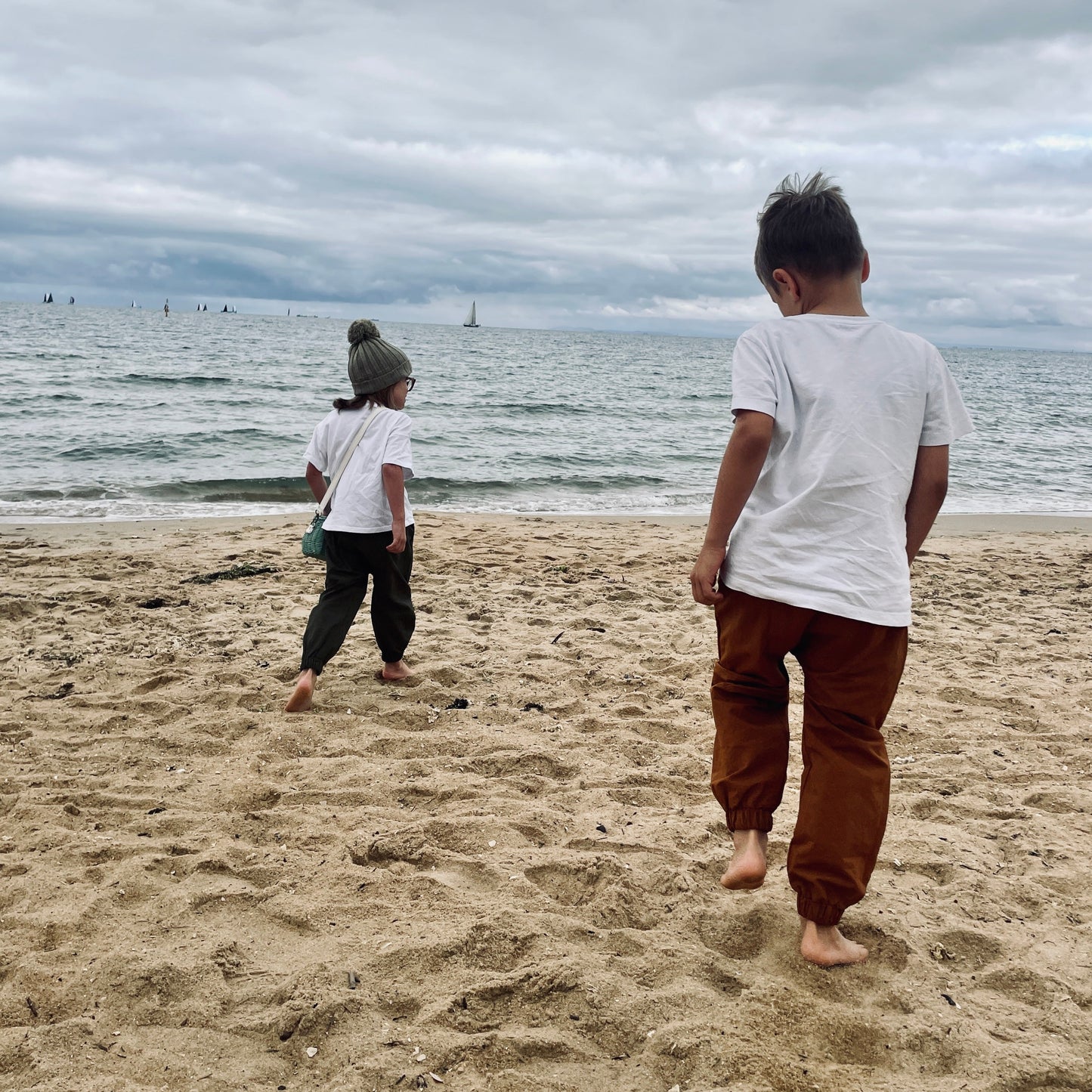 a day on the beach, even when it's cold is good for the soul. protective outwear is the perfect way to dress when you know they are always going to find the water, even when its chilly