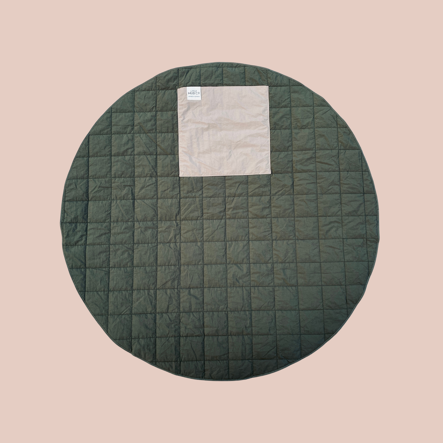 sustainable waterproof anytime rug. the perfect play mat or picnic rug in a leafy green colour. round 1.3m diameter. folds up into its own inbuilt pocket.
