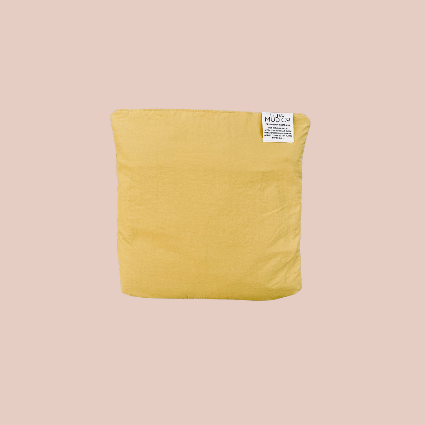 sustainable waterproof anytime rug. the perfect play mat or picnic rug in sand colour. round 1.3m diameter. folds up into its own inbuilt bright yellow pocket.